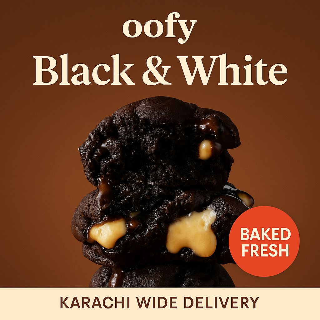Chocolate cookies with white cream filling on a brown background, labeled 'oofy Black & White'.