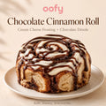 Chocolate cinnamon roll with cream cheese frosting and chocolate drizzle on a plate, branded 'oofy'.
